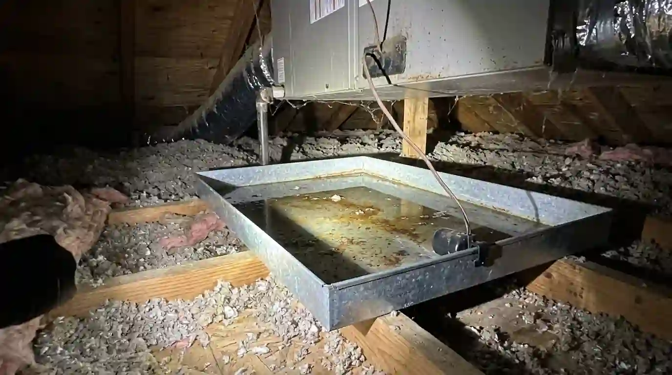 Water in a secondary drain pan with a float switch